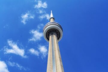 CN Tower against blue sky.